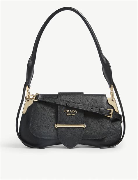 news prada saddle bag|Prada evening bag.